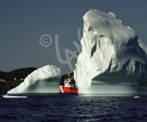 Twillingate, iceberg and coast guard ship